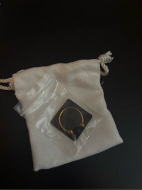 La Soula Jewelry Gold Adjustable Ring in Soft Drawstring Pouch in Ivory
